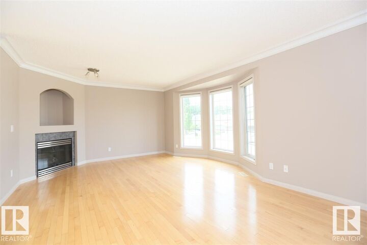 Property Photo:  10903 8 Avenue SW  AB T6W 1G1 
