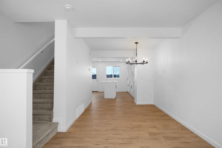 Property Photo:  1009 Cy Becker Road NW 111  AB T5Y 4B7 
