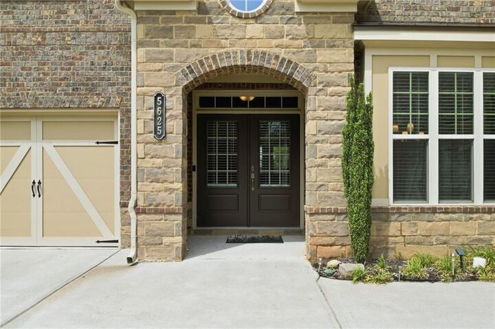 Property Photo:  5625 Turnbridge Pass  GA 30040 
