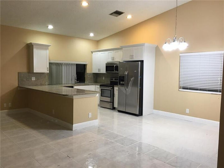 Property Photo:  9555 NW 25th Court  FL 33065 