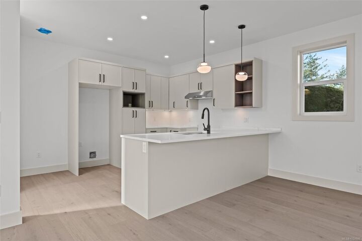 Property Photo: 571 Bezanton Way #1 BC V9C 0H2