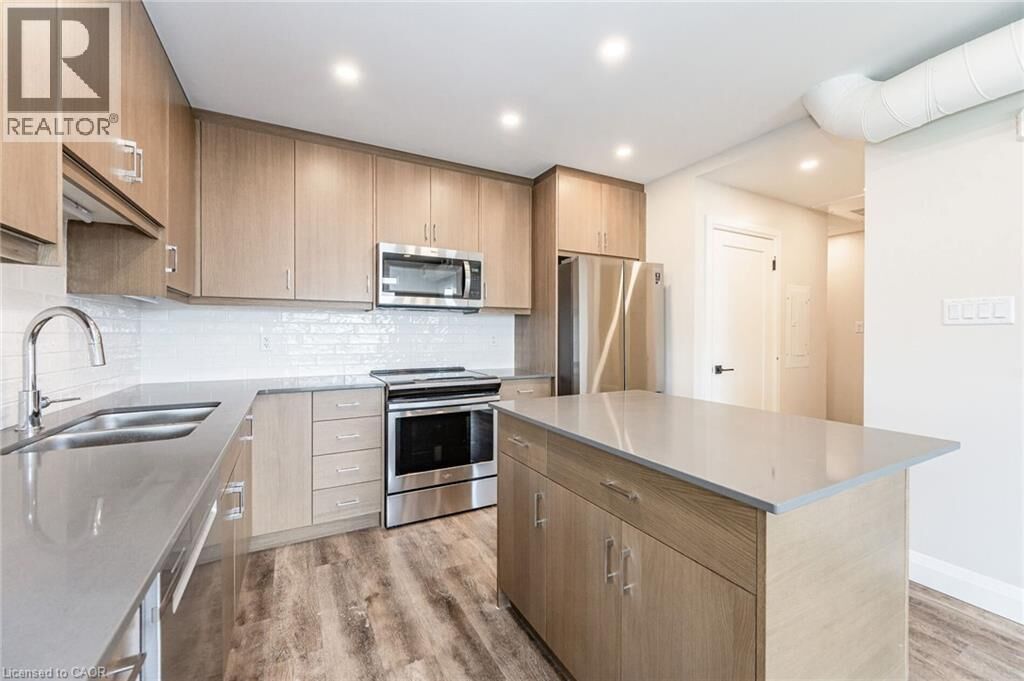 Property Photo:  72 Erb Street East 203  ON N2J 1L8 