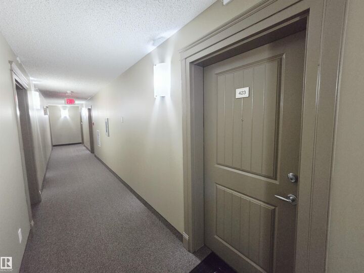 Property Photo:  13907 136 Street NW 423  AB T6V 1Y5 