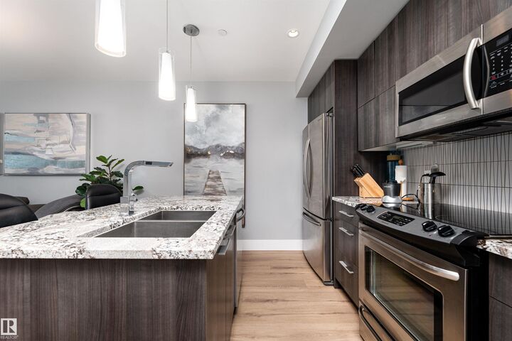 Property Photo:  11969 Jasper Avenue NW 1404  AB T5K 0P1 