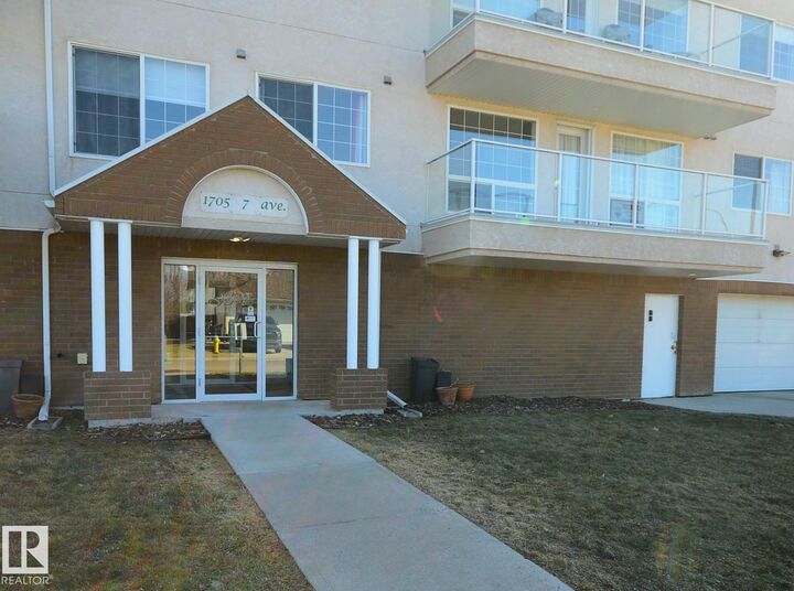 Property Photo:  1705 7 Avenue 102  AB T9M 9A6 