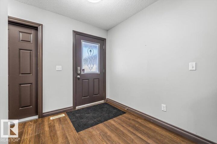 Property Photo:  2005 70 Street SW 50  AB T6X 0T9 