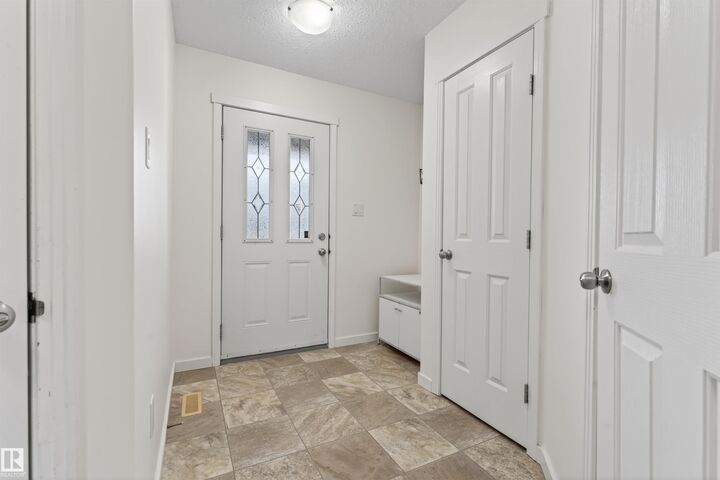 Property Photo:  702C Rocky Way  AB T9M 0H3 