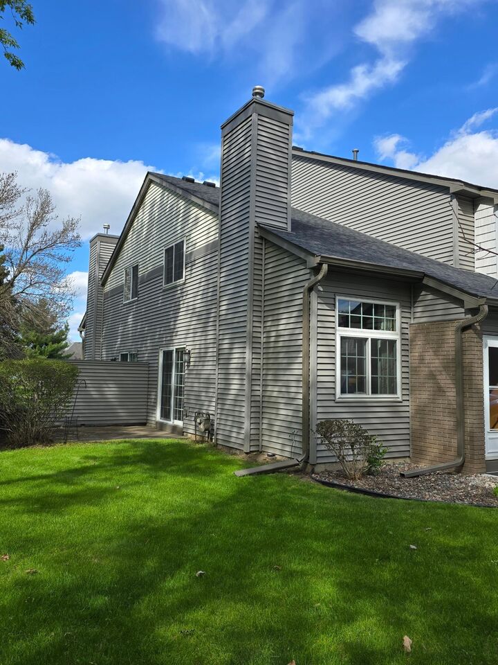 Property Photo: 9935 Russell Avenue N 7 MN 55444
