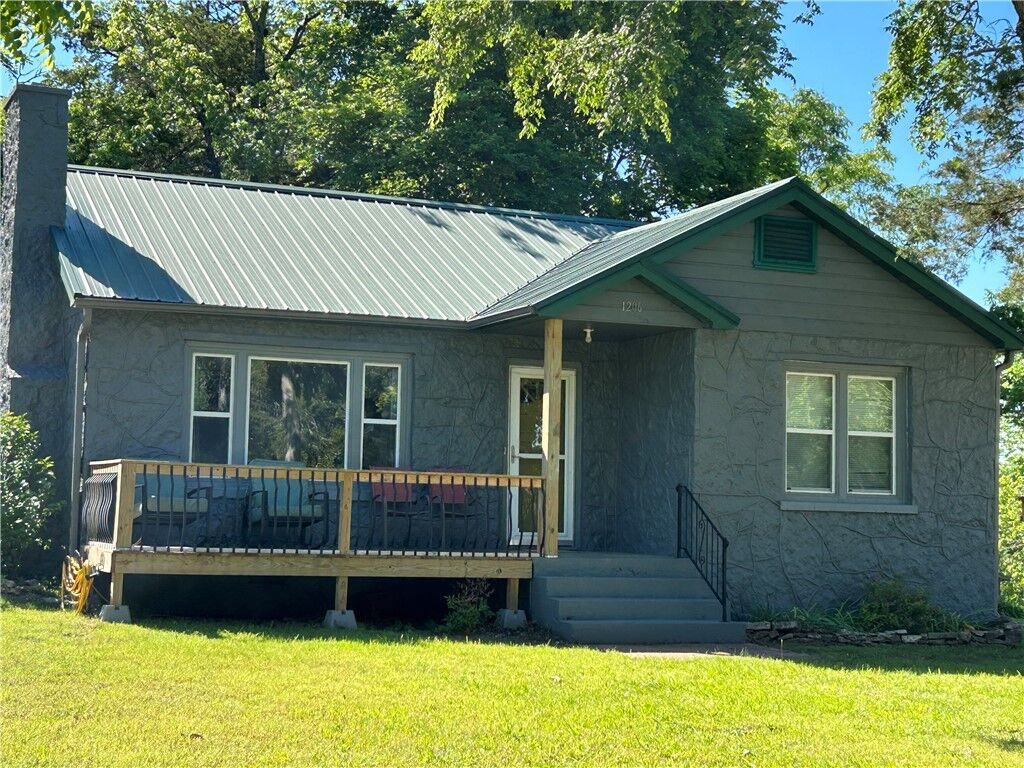 Property Photo:  1206 N Diamond Boulevard  AR 72644 