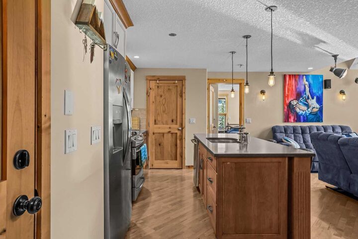 Property Photo:  2100A Stewart Creek Drive 302  AB T1W 0G3 