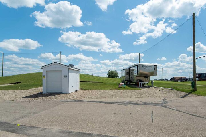 Property Photo:  25054 South Pine Lake Road 6124  AB T0M 1R0 