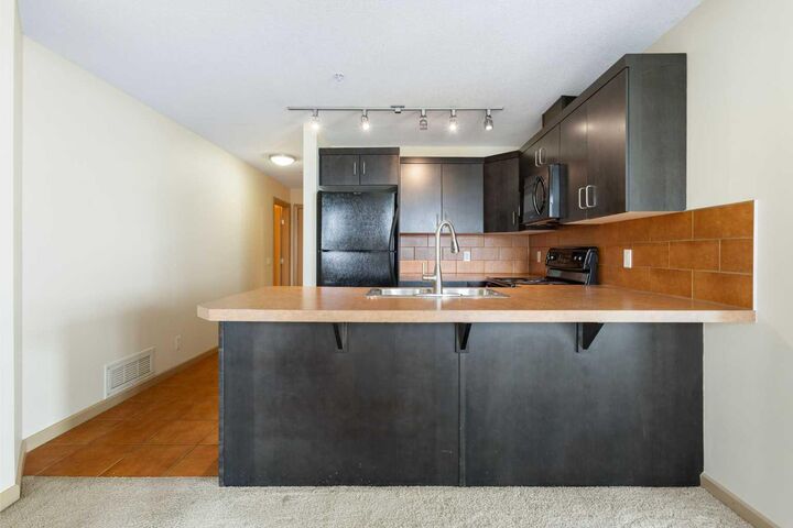 Property Photo:  1410 1 Street SE 610  AB T2G 5T7 