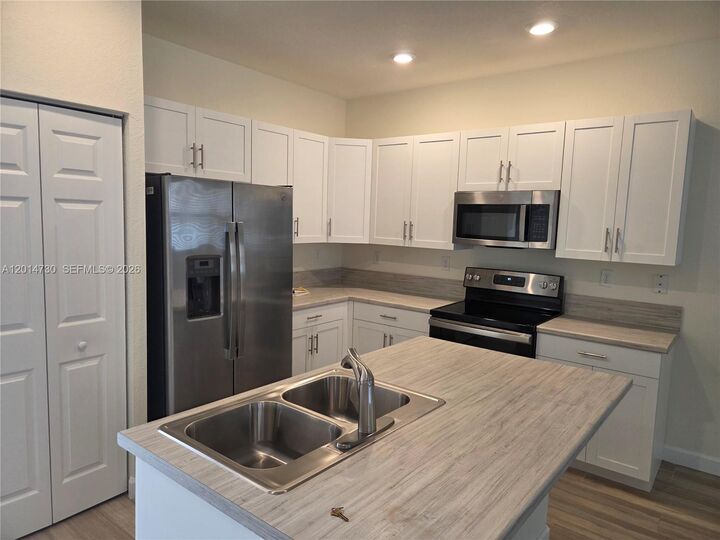 Property Photo:  10840 W 33rd Ln  FL 33018 