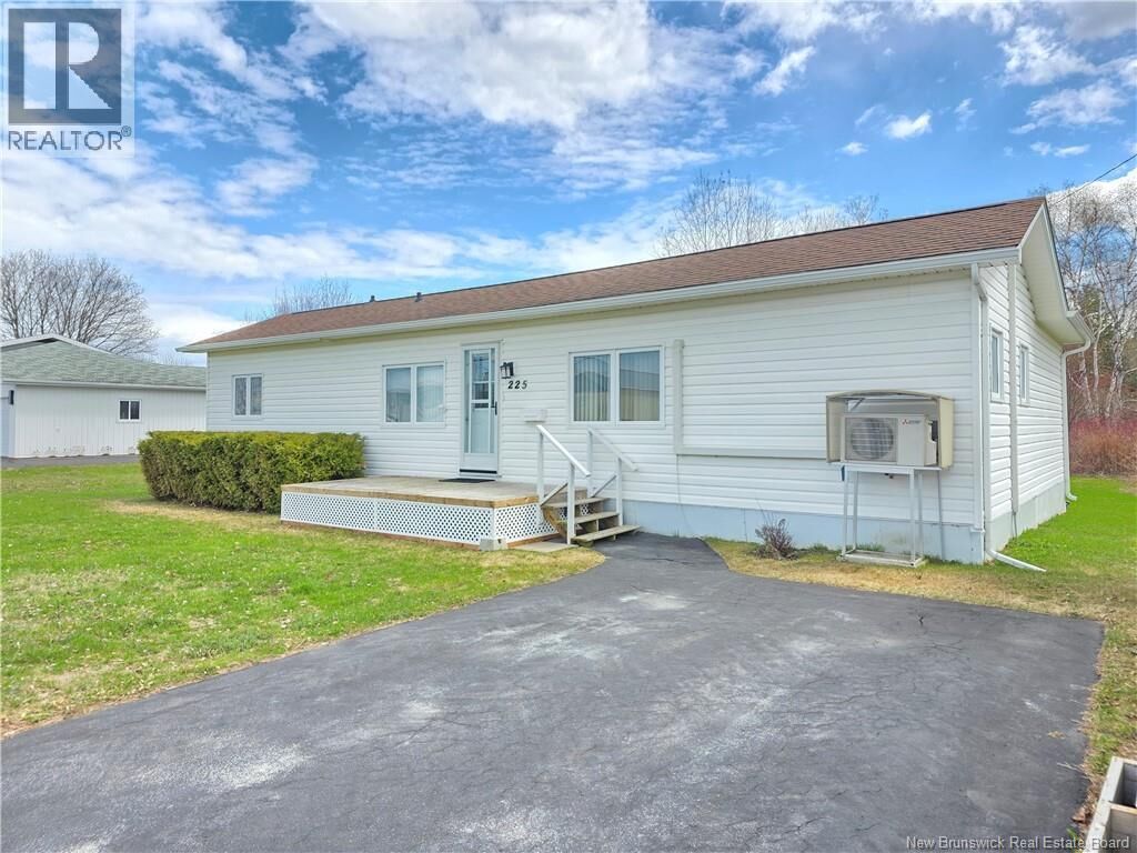 Property Photo:  225 Parc  NB E8K 1V9 