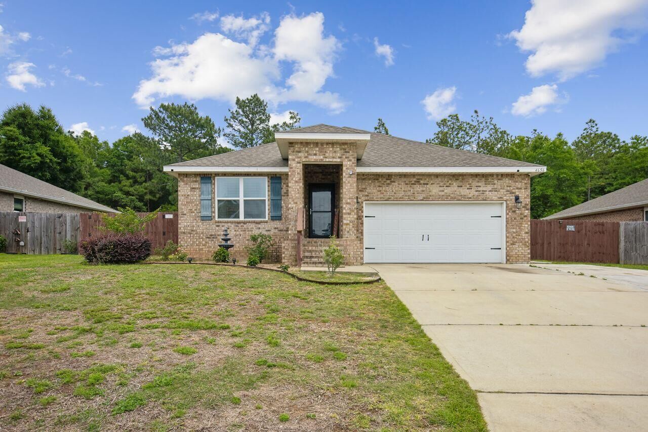 Property Photo:  4656 Red Oak Drive  FL 32583 