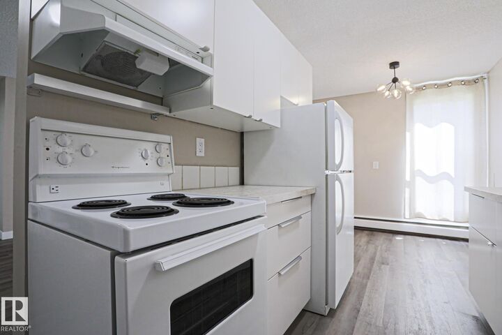Property Photo:  7220 144 Avenue NW 118  AB T5C 3E4 