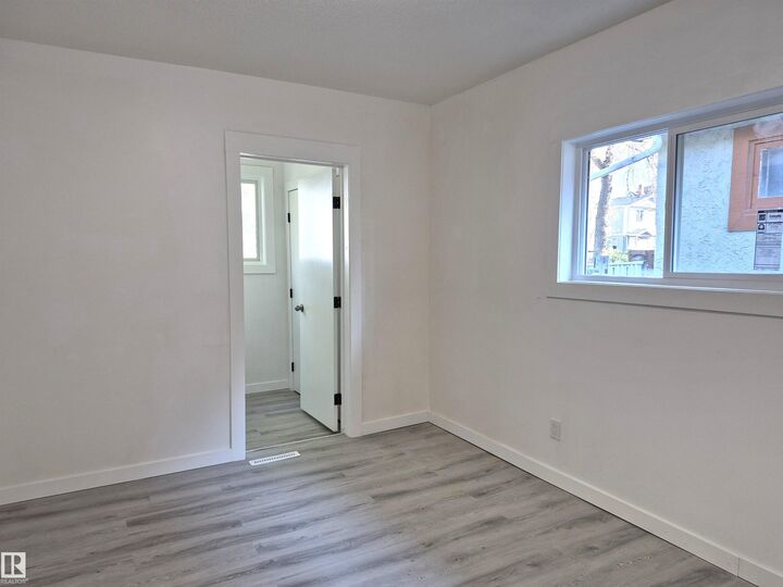 Property Photo:  11240 94 Street NW  AB T5G 1G9 