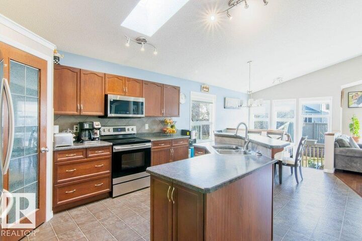 Property Photo:  6103 5 Avenue SW  AB T6X 0E8 