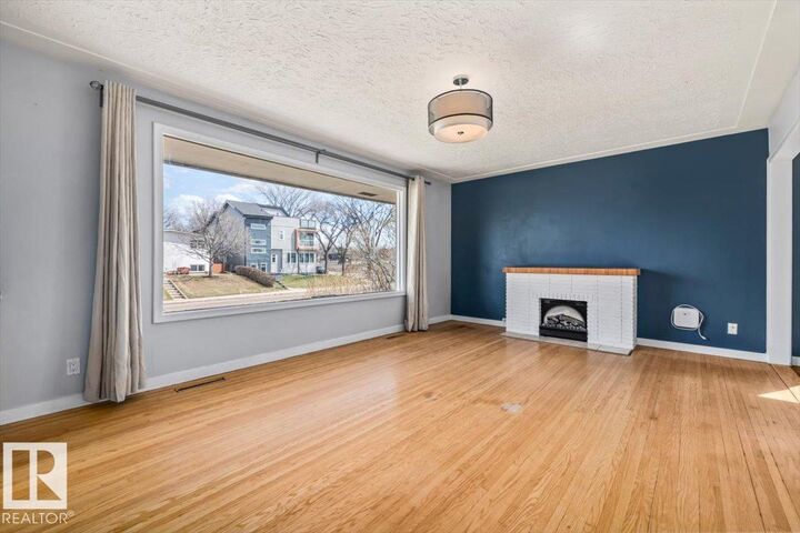 Property Photo:  9828 79 Street NW  AB T6A 3G1 