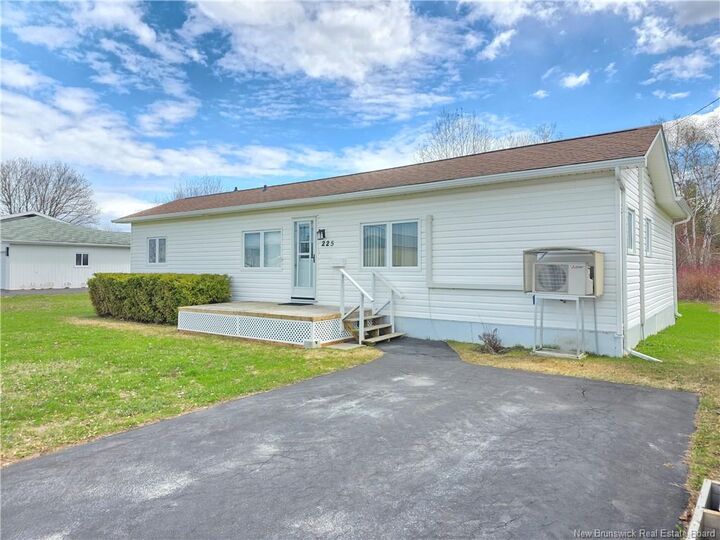 Property Photo:  225 Parc  NB E8K 1V9 