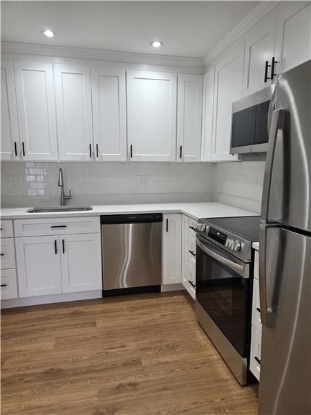 Property Photo:  1000 Lexington 36  MA 02452 