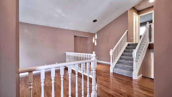 Property Photo:  48 Riverbrook Road SE  AB T2C 3P9 