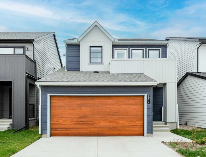 Property Photo:  317 Baneberry Way SW  AB T4B 5R9 