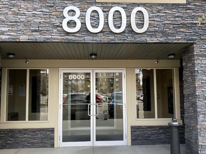 Property Photo:  403 Mackenzie Way SW 8104  AB T4B 3V7 