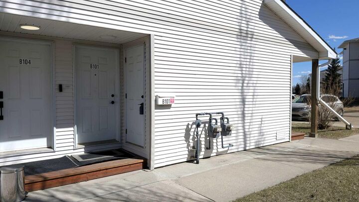 Property Photo:  4917 68 Street 101B  AB T4V 4T8 