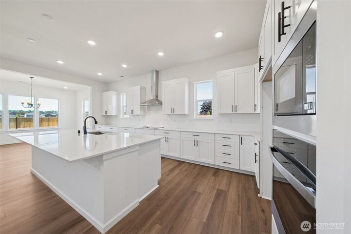 Property Photo:  20833  Chad Lane E 1407  WA 98391 