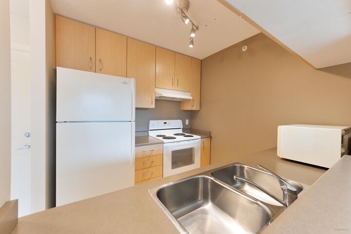 Property Photo:  3663 Crowley Drive 312  BC V5R 6H4 