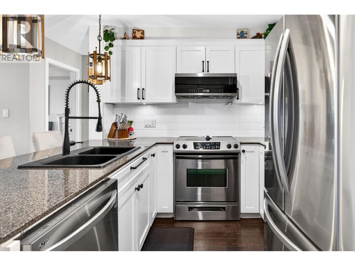 Property Photo:  19673 Meadow Gardens Way 433  BC V3Y 0A1 