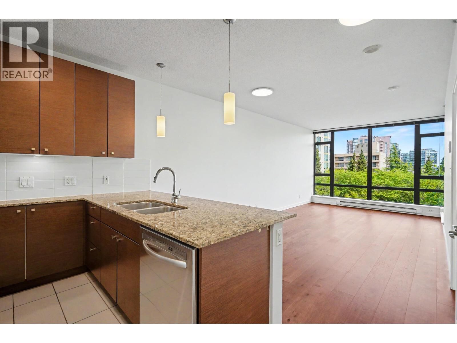 Property Photo:  6888 Alderbridge Way 702  BC V8B 0L8 