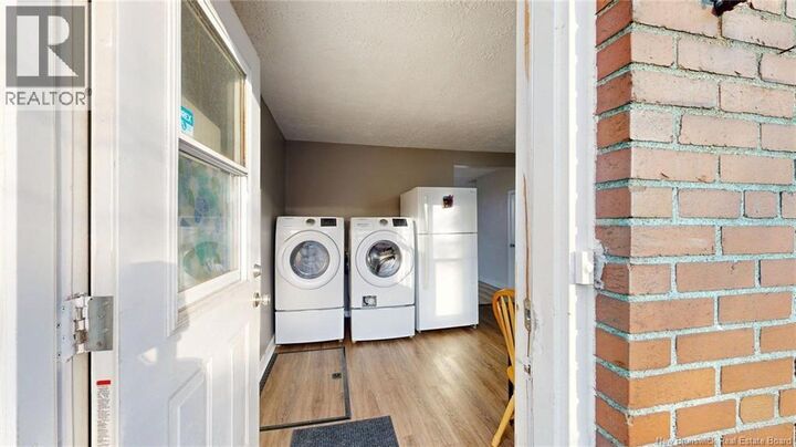 Property Photo:  235 Gilbert Street  NB E2K 4E4 