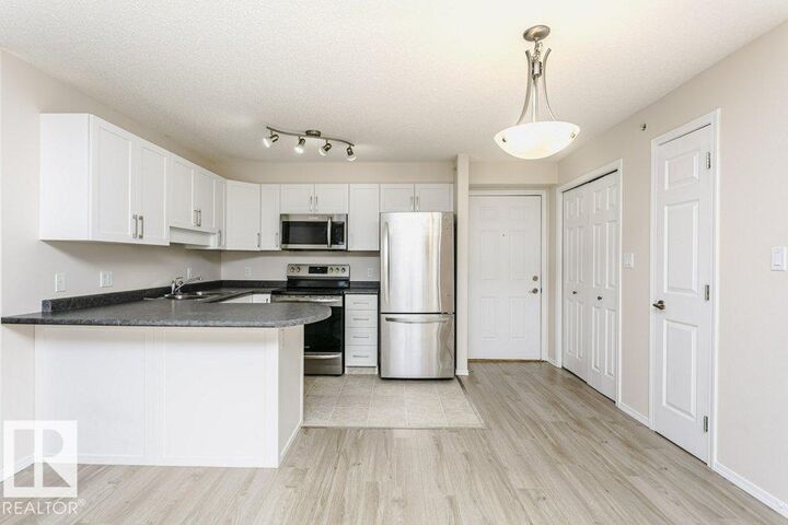 Property Photo:  13625 34 Street NW 423  AB T5A 0E3 