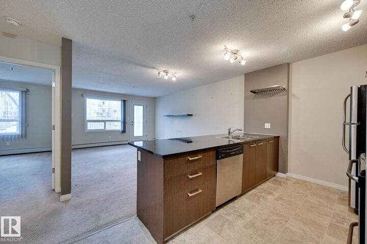 Property Photo:  9351 Simpson Drive NW 3104  AB T6R 0N4 
