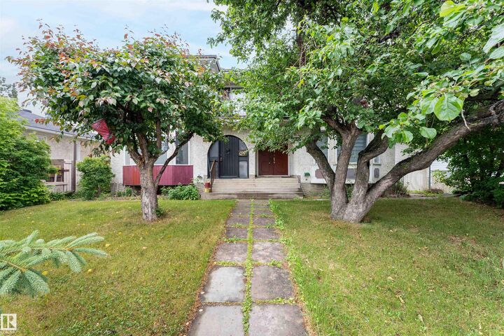 Property Photo:  12411 94 Street NW  AB T5G 1K5 