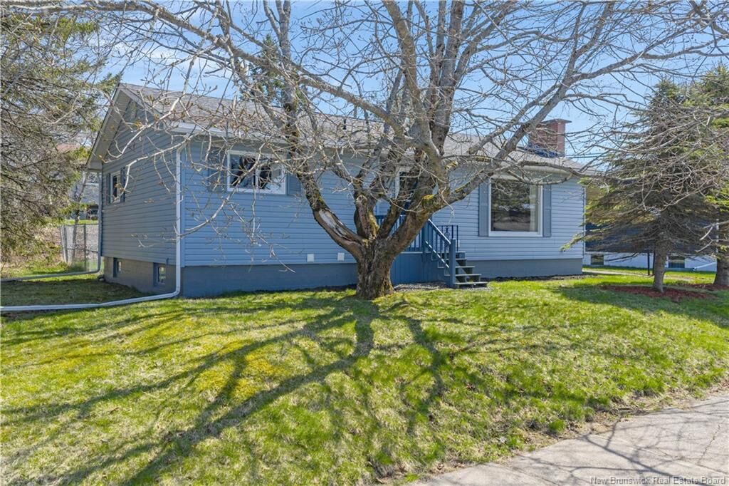 Property Photo:  892 Mollins Drive  NB E2M 4L8 