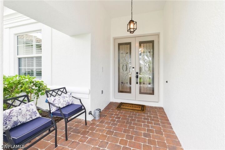 Property Photo:  5640 Lago Villaggio Way  FL 34104 