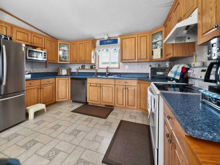 Property Photo: 10202 Homestead Way AB T0H 2H0
