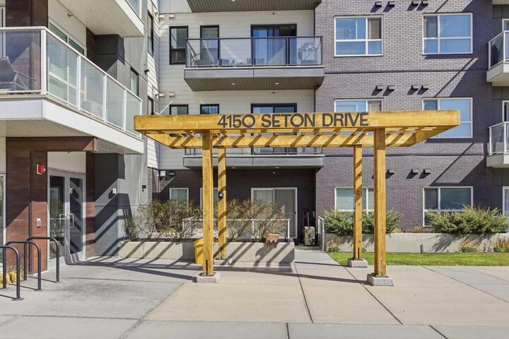 Property Photo:  4150 Seton Drive SE 204  AB T3M 3C7 