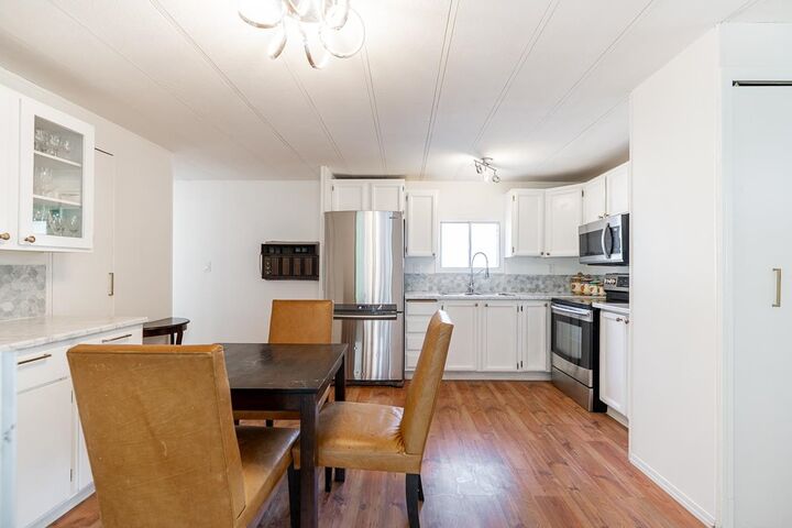 Property Photo:  13560 80 Avenue 5  BC V3W 6J8 