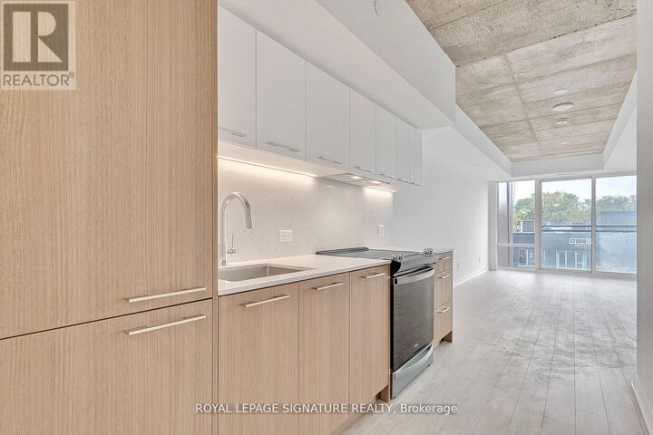 Property Photo: 665 Queen Street East 221 ON M4M 0G3
