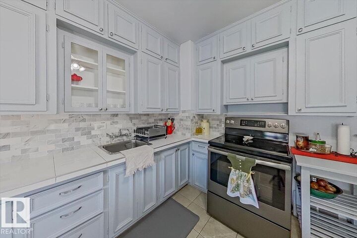 Property Photo:  10939 96 Street NW  AB T5H 2K6 