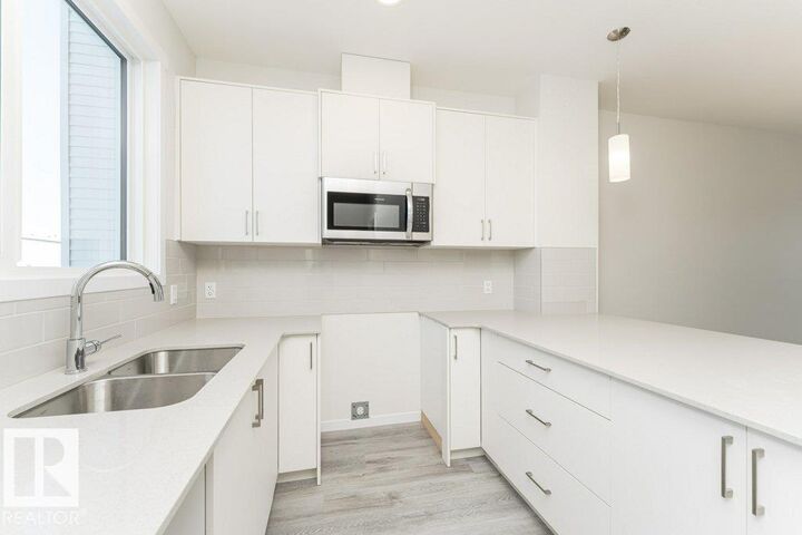 Property Photo: 3896 Wren Crescent NW AB T5S 0S9