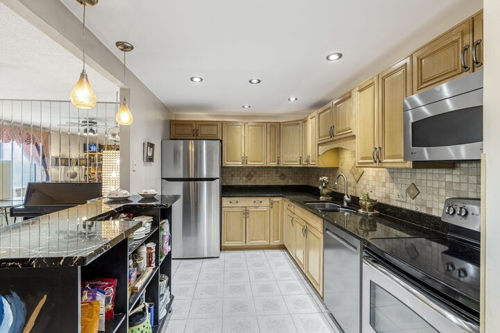 Property Photo:  9731 N Fox Glen Drive 4C  IL 60714 