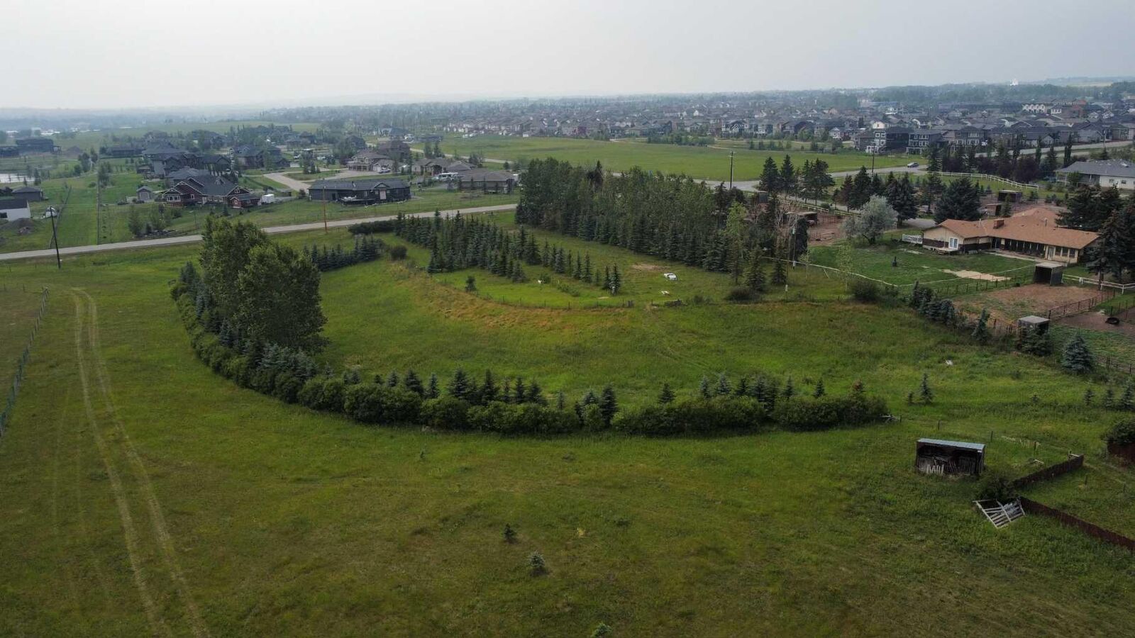 Property Photo:  354158 48 Street E  AB T1S 0R3 