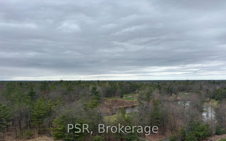 Property Photo: 100 Carrick Trail 607 ON P1P 0J5