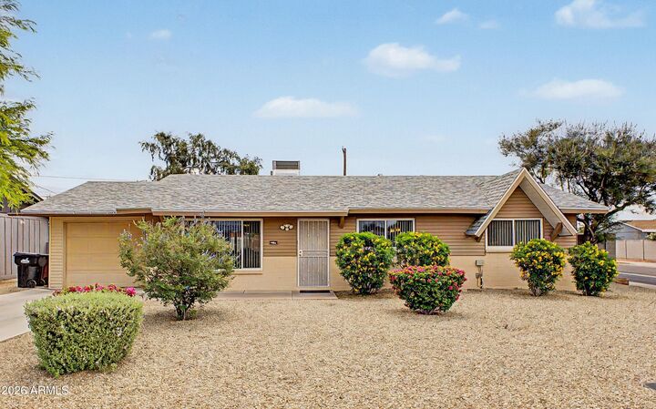 Property Photo:  8701 E Vernon Avenue  AZ 85257 