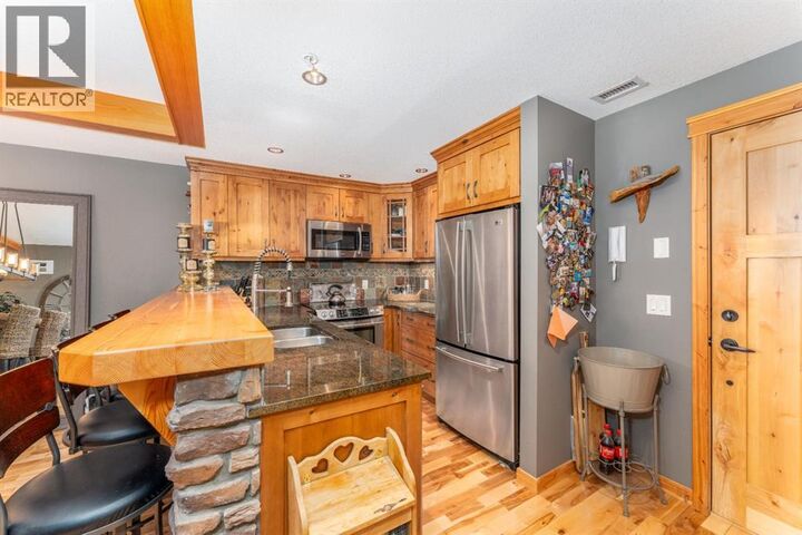 Property Photo: 101 Stewart Creek Landing AB T1W 0E3